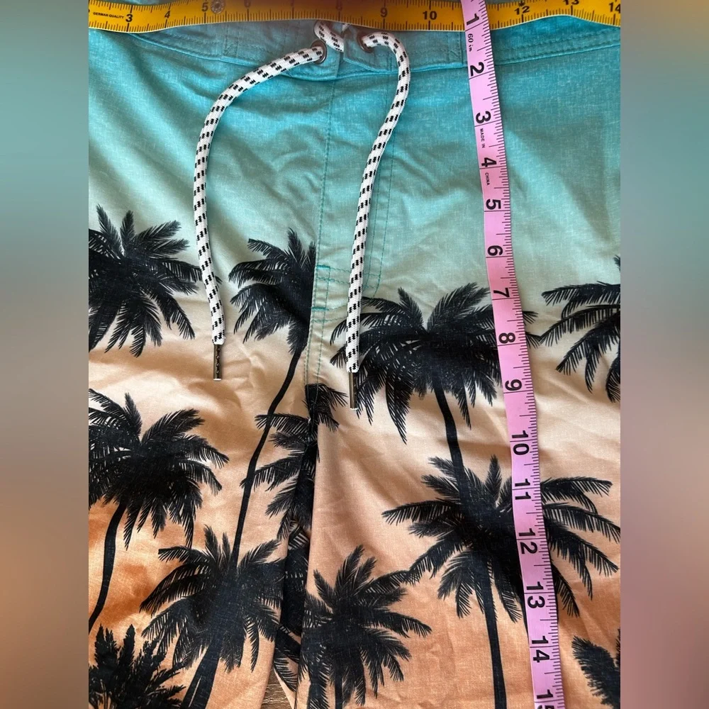 Sonoma Small swim trunks blue and brown.